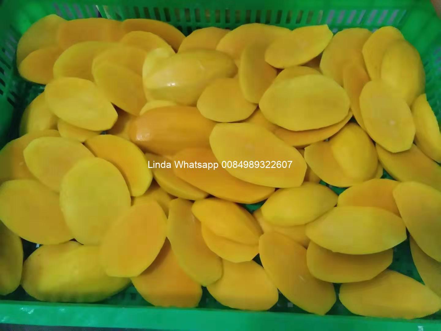 Frozen mango half cut Frozen mango half cut